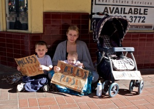 Homeless woman and children